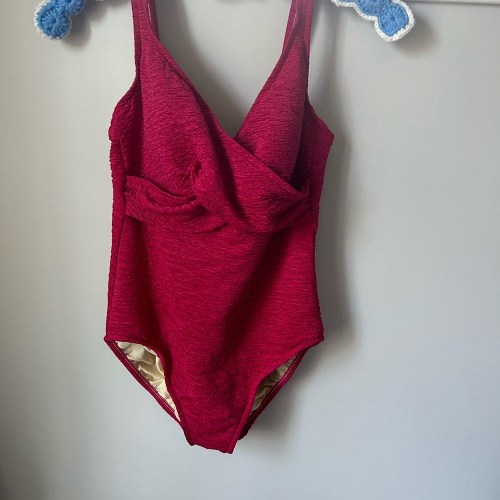 One piece raspberry colored bathing suit